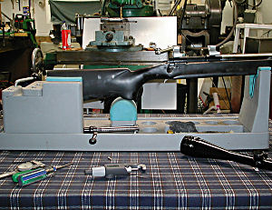 photo of rifle in block